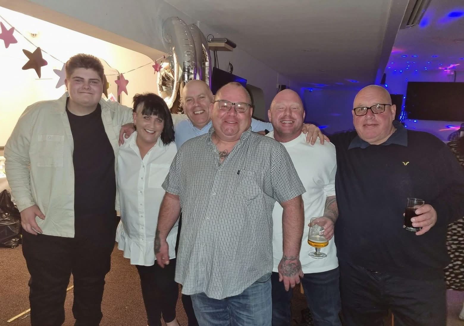 The Drewett family celebrating together