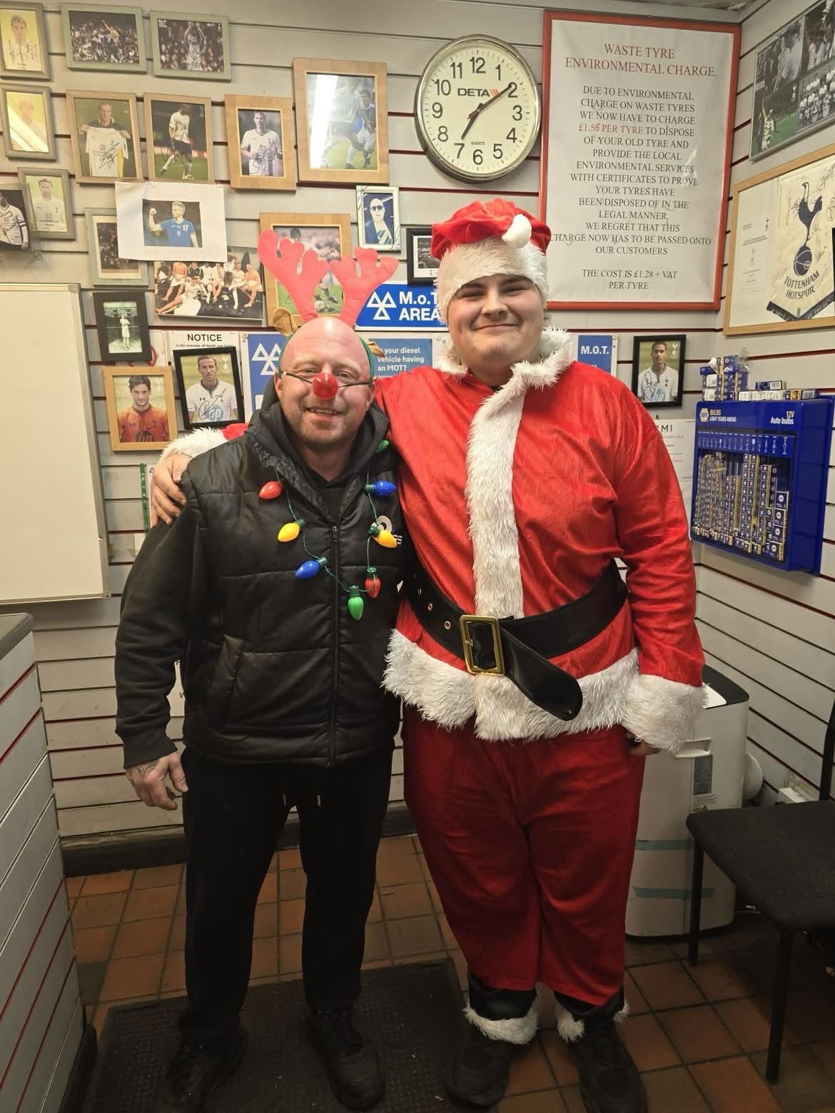 Father and son at the front desk, Christmas at Speedy Fit